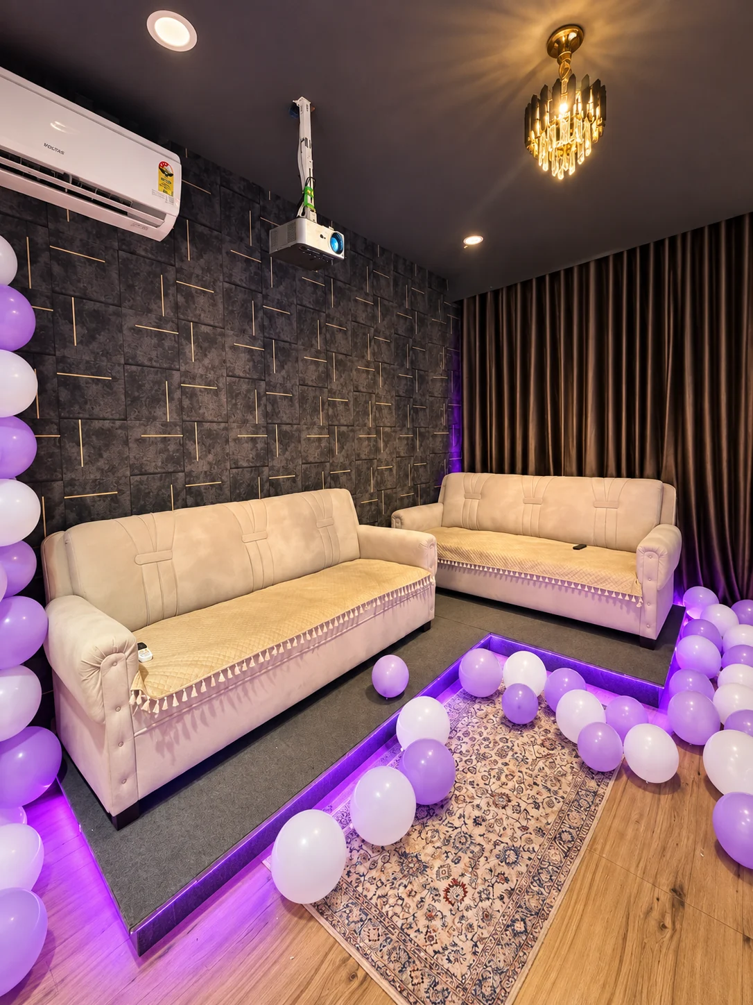 Cream sofa seating in the decorated private studio